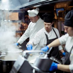 Group,Of,Chefs,Working,In,The,Kitchen
